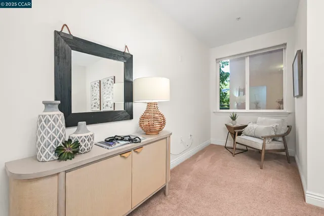 a bed room with a bed and a chandelier