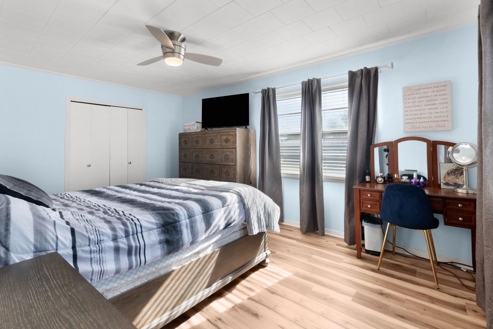1365 Norma Tow, TX 78672 - Photo 27 of 45 a bedroom with a bed and a chandelier
