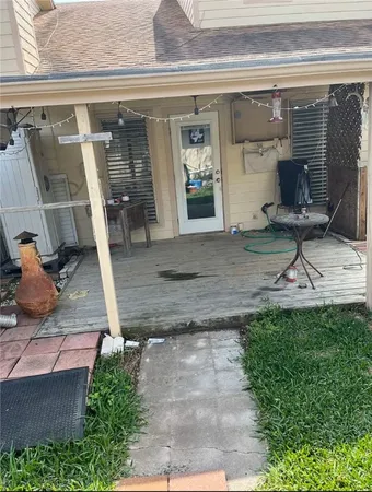 a view of a porch with seating space