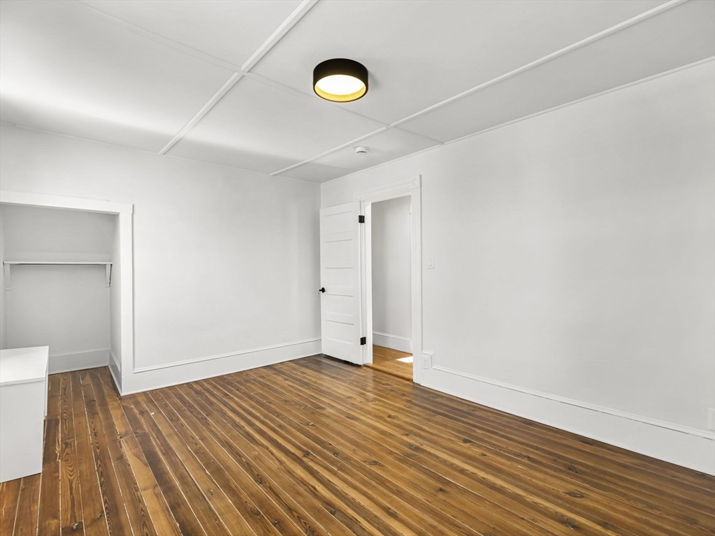 224 Pelham Street Methuen, MA 01844 - Photo 23 of 40 a view of empty room with wooden floor