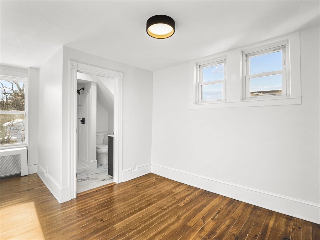 224 Pelham Street Methuen, MA 01844 - Photo 29 of 40 a view of a room with wooden floor and window