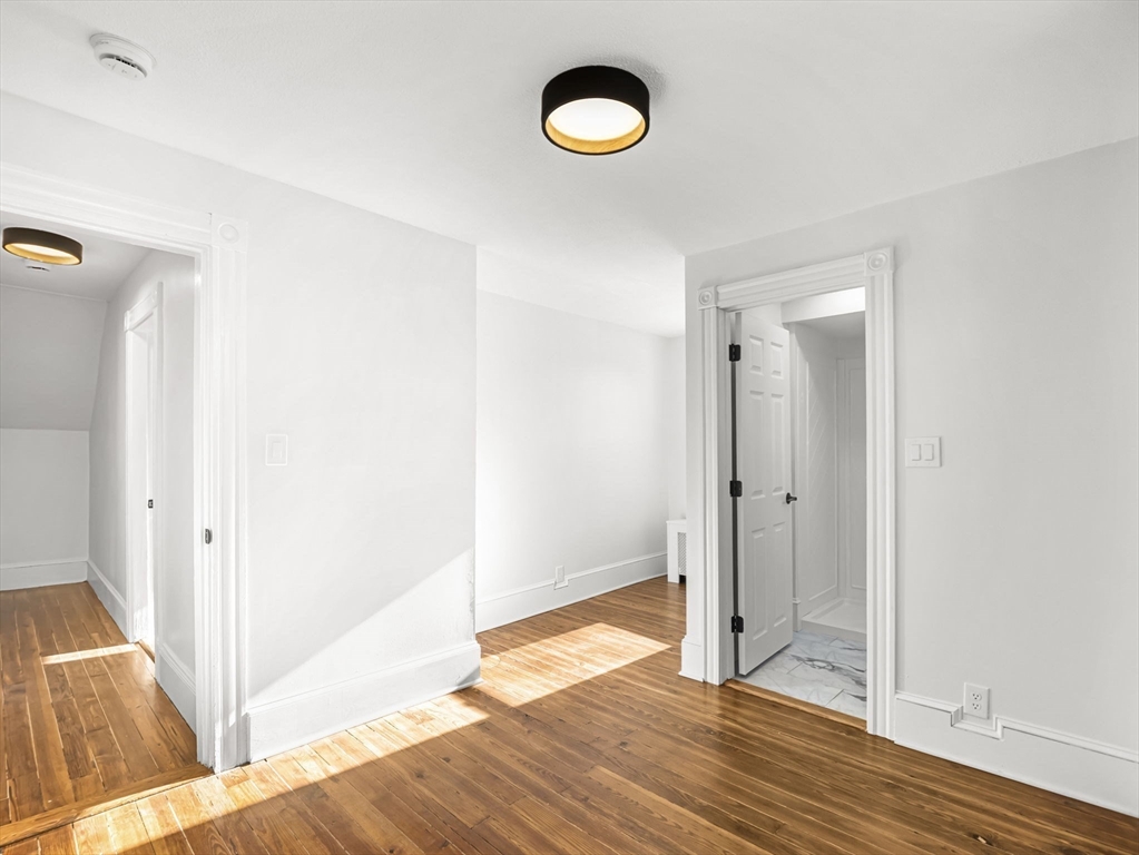 224 Pelham Street Methuen, MA 01844 - Photo 30 of 40 a view of a room with wooden floor and window