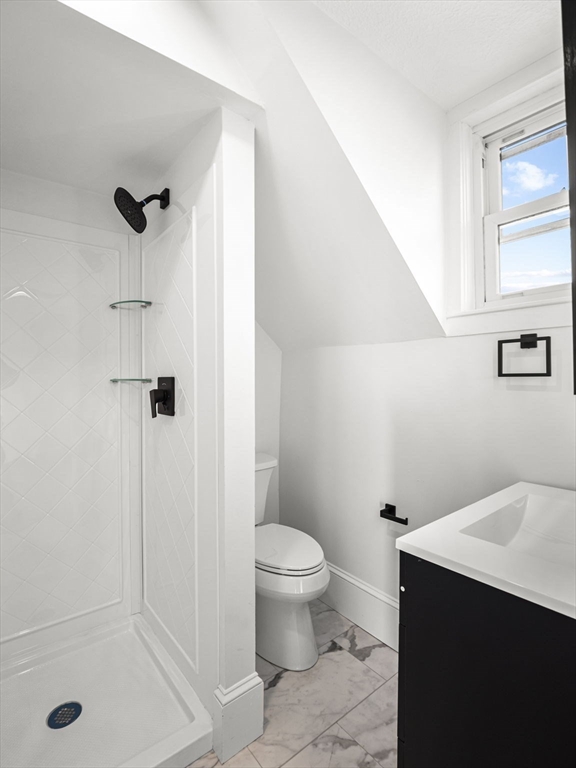 224 Pelham Street Methuen, MA 01844 - Photo 33 of 40 a bathroom with a sink a toilet and shower