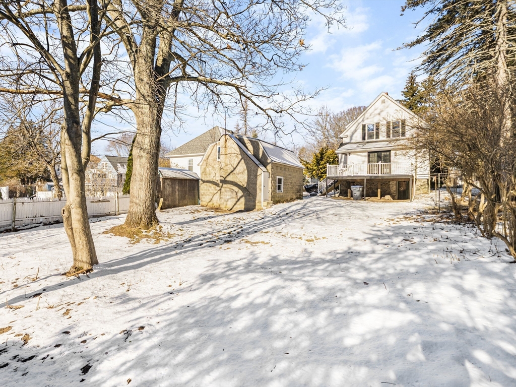 224 Pelham Street Methuen, MA 01844 - Photo 37 of 40 a view of a white house with a yard