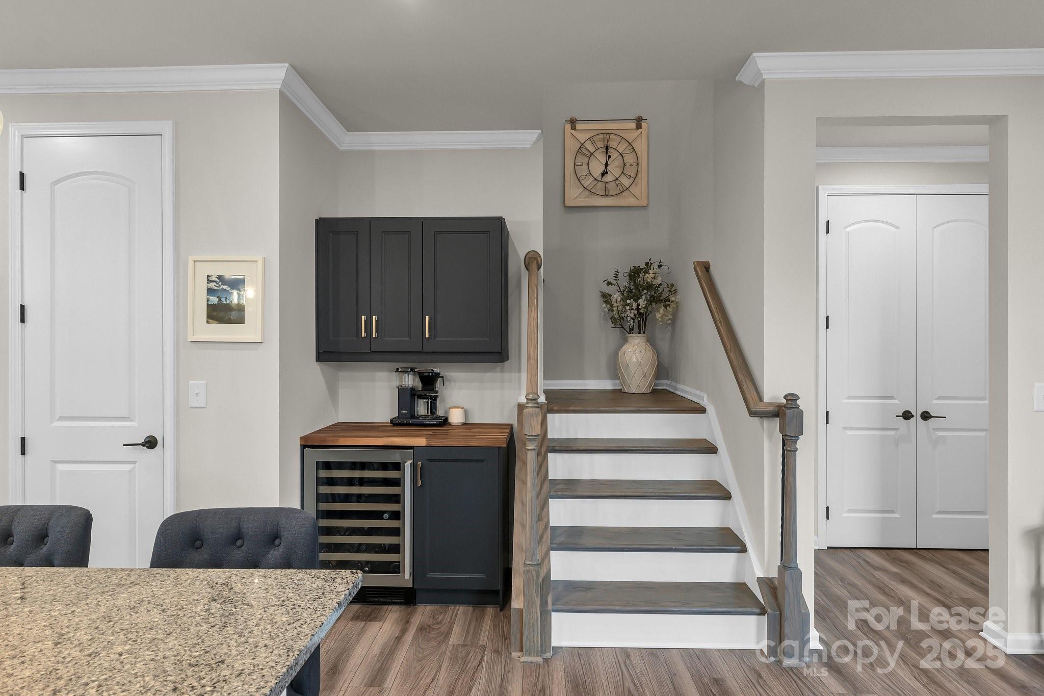 16764 Summers Walk Boulevard Davidson, NC 28036 - Photo 12 of 26 a view of a hallway with wooden floor and stairs