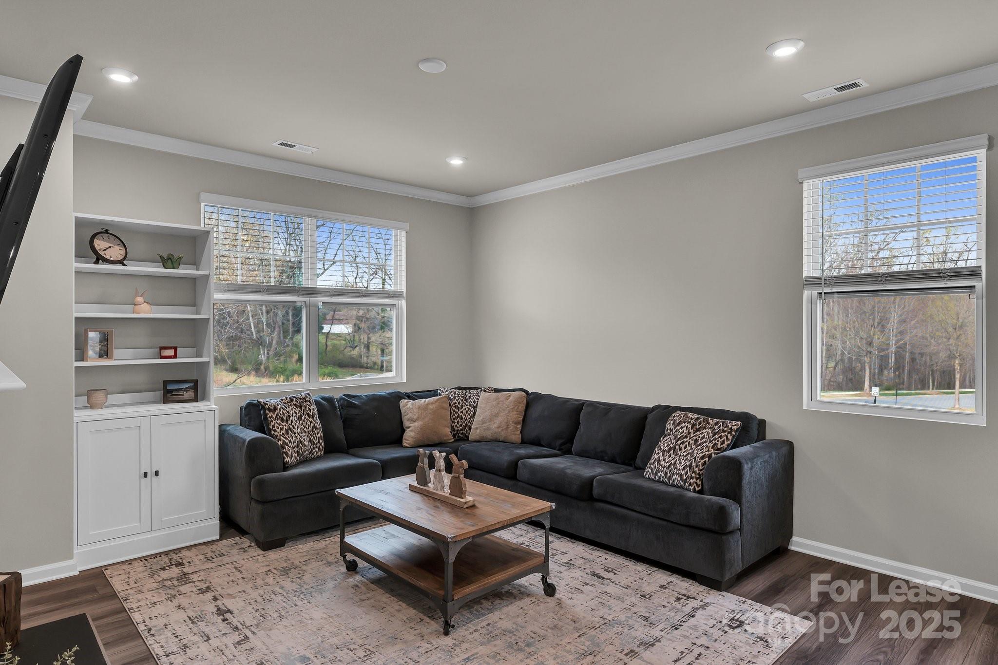 16764 Summers Walk Boulevard Davidson, NC 28036 - Photo 14 of 26 a living room with furniture and a window