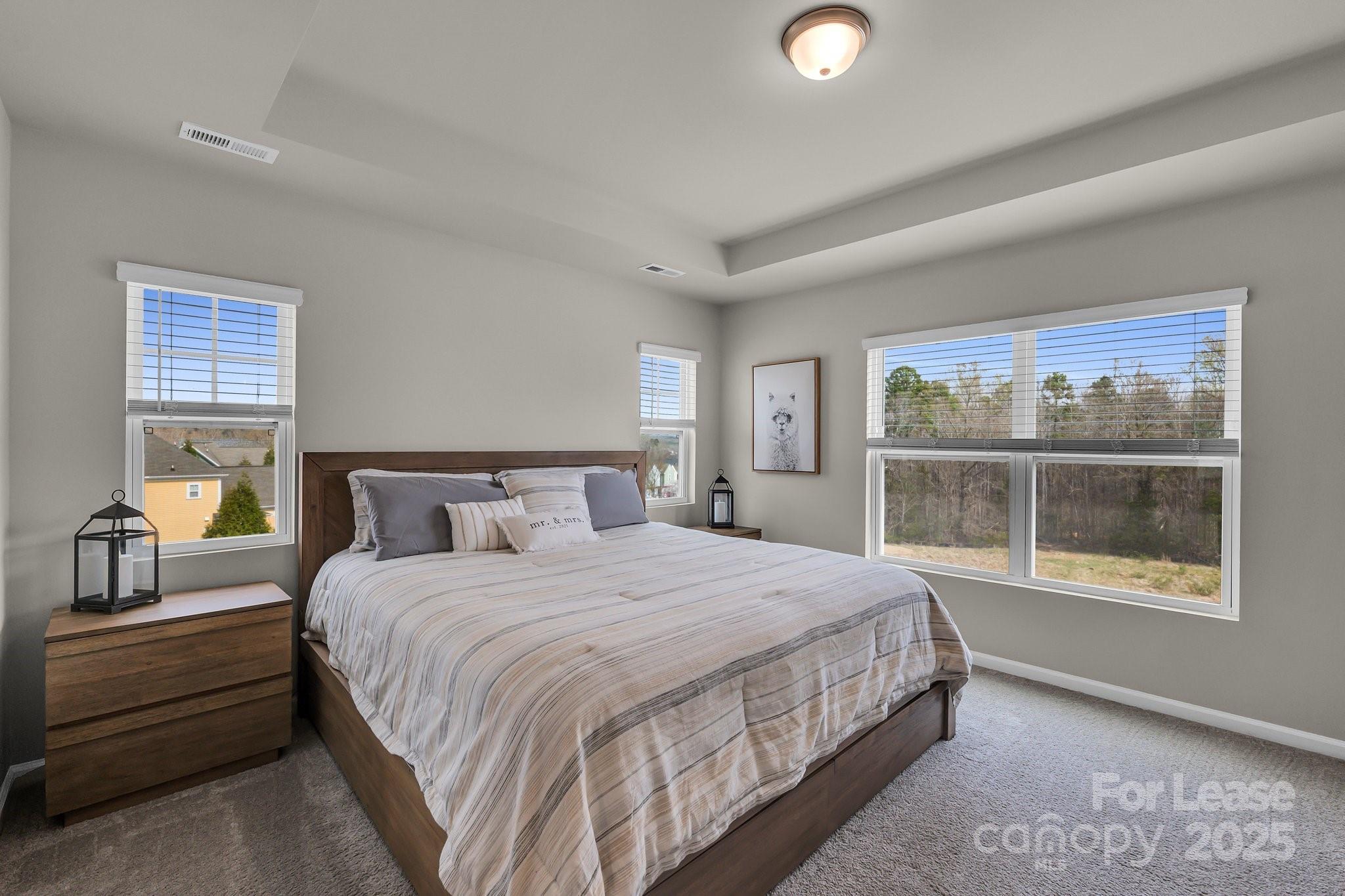 16764 Summers Walk Boulevard Davidson, NC 28036 - Photo 18 of 26 a bedroom with a large bed and a window
