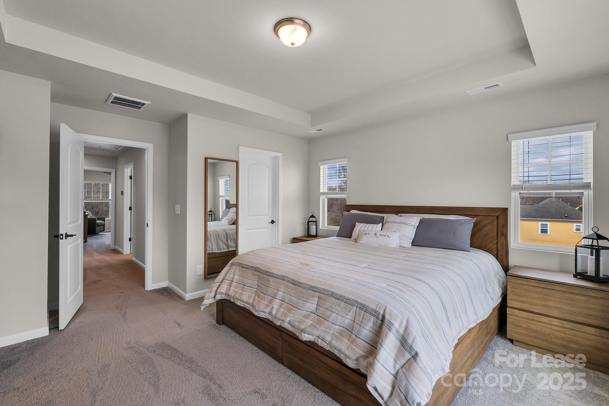 16764 Summers Walk Boulevard Davidson, NC 28036 - Photo 19 of 26 a bedroom with a bed and large window