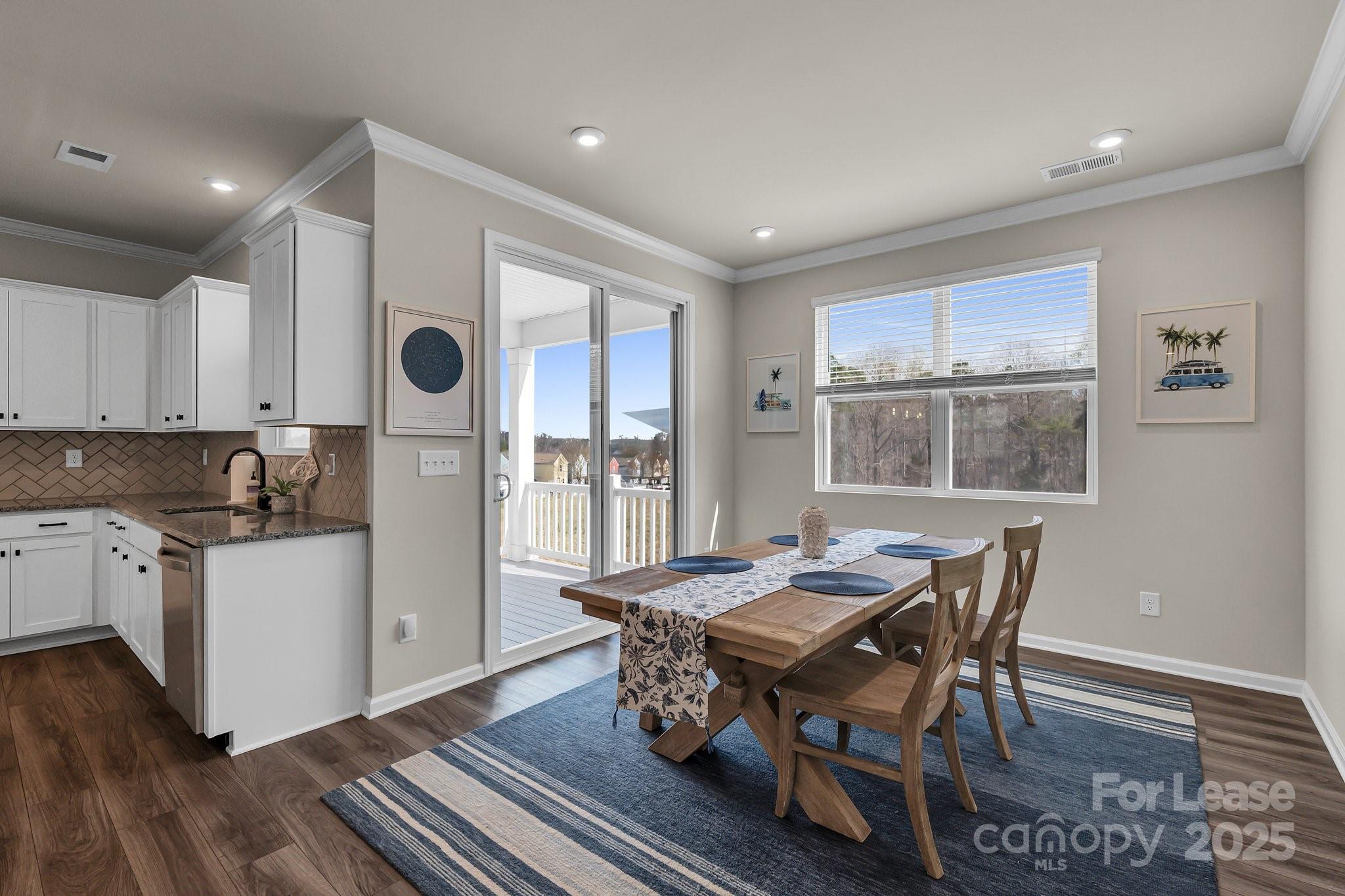 16764 Summers Walk Boulevard Davidson, NC 28036 - Photo 8 of 26 a view of a dining room with furniture and window