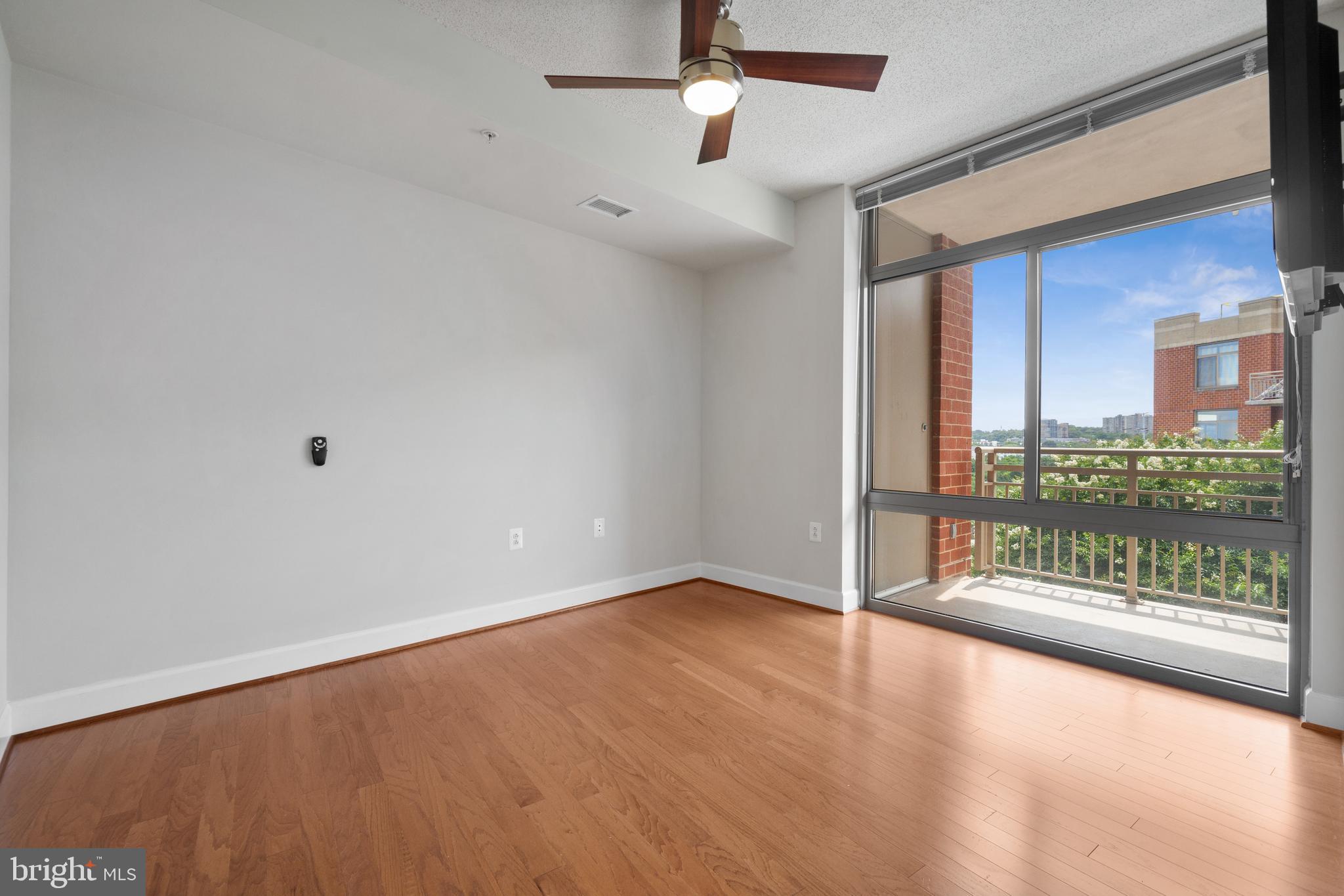 3600 South Glebe Road, Unit 526W Arlington, VA 22202 - Photo 13 of 34 a view of an empty room with a balcony