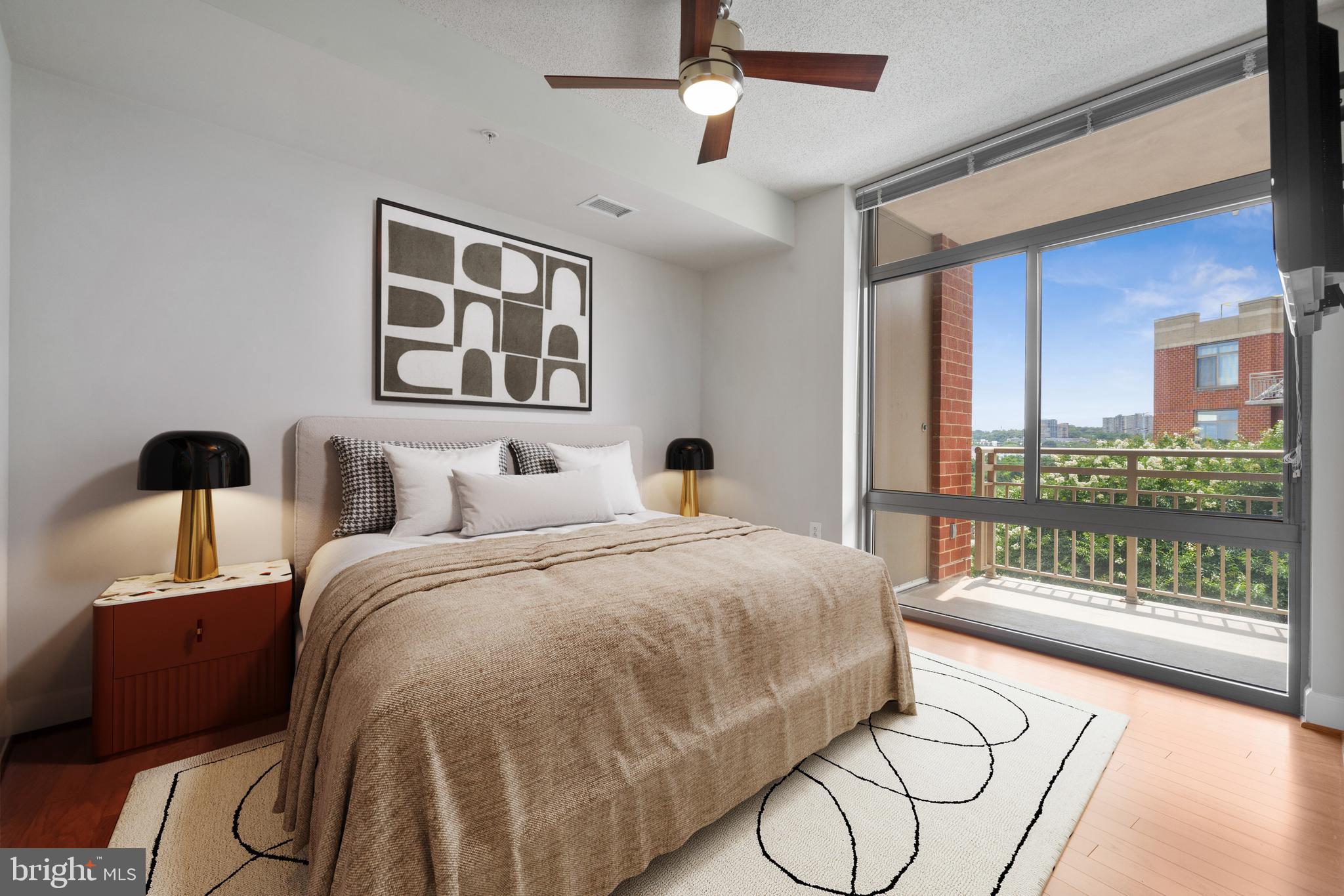 3600 South Glebe Road, Unit 526W Arlington, VA 22202 - Photo 14 of 34 a spacious bedroom with a bed and glass door