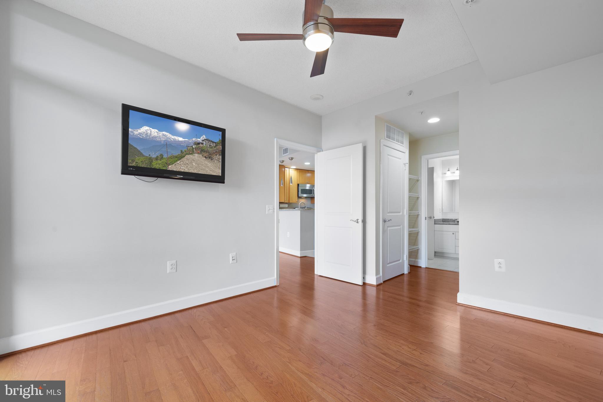 3600 South Glebe Road, Unit 526W Arlington, VA 22202 - Photo 16 of 34 wooden floor in an empty room with a window
