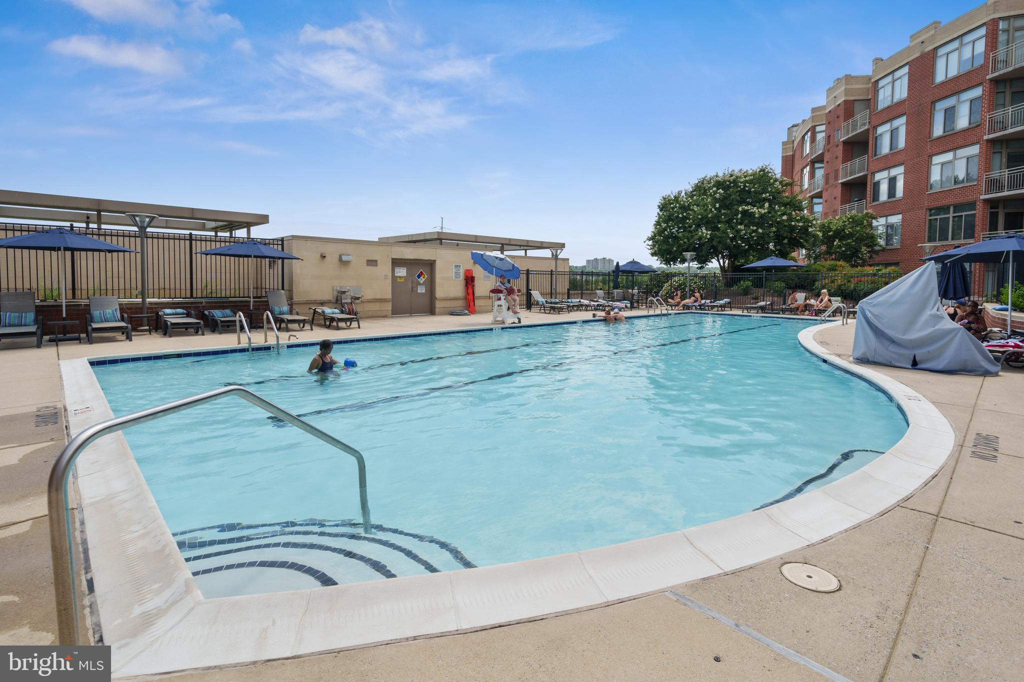 3600 South Glebe Road, Unit 526W Arlington, VA 22202 - Photo 33 of 34 a view of a swimming pool with a yard