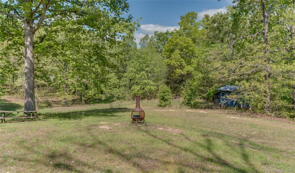 246 Clark Road Rutherfordton, NC 28139 - Photo 3 of 24 a view of outdoor space with deck and yard