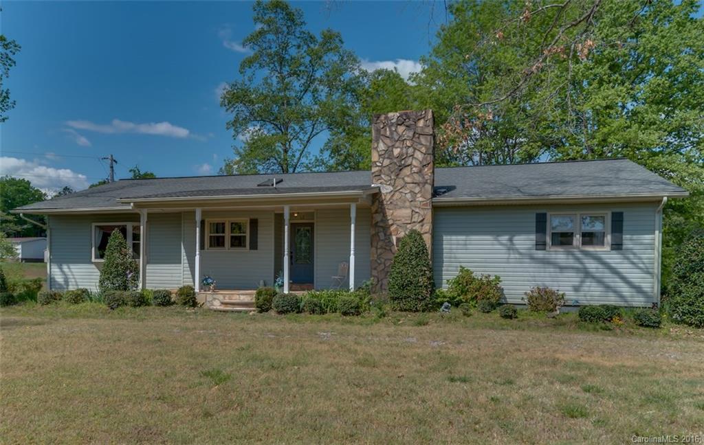 246 Clark Road Rutherfordton, NC 28139 - Photo 22 of 24 a front view of a house with garden