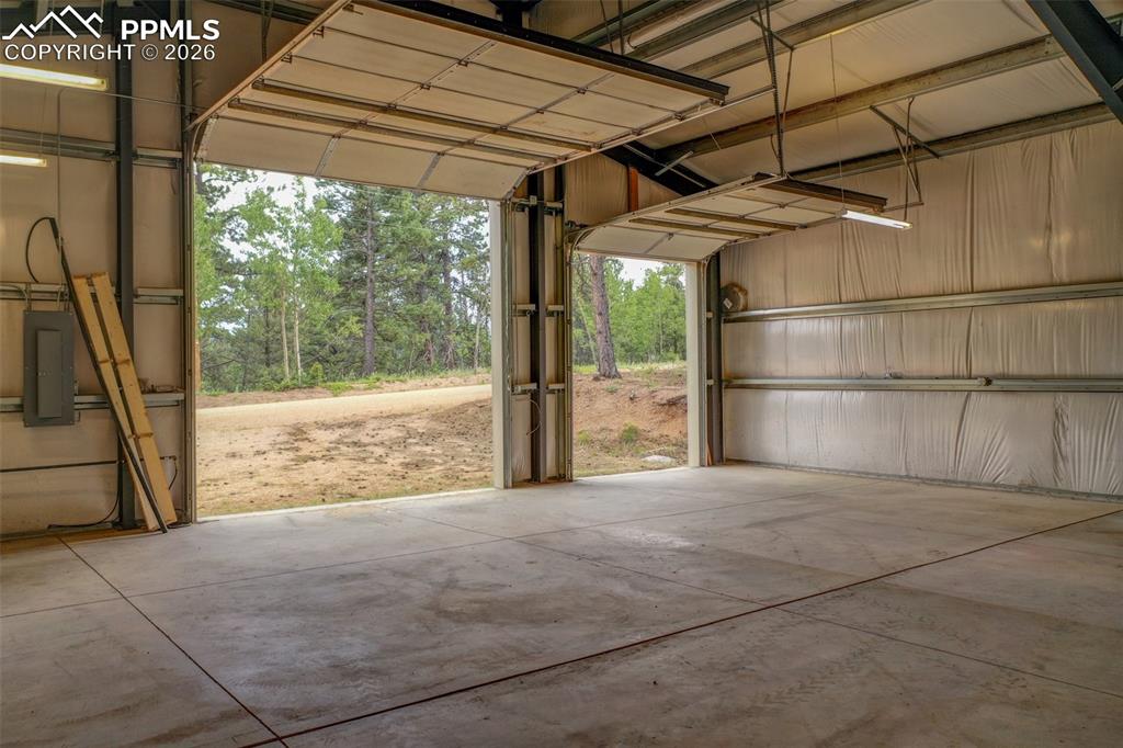 449 Woody Creek Road Divide, CO 80814 - Photo 15 of 20 a view of outdoor space with sliding door and wooden floor