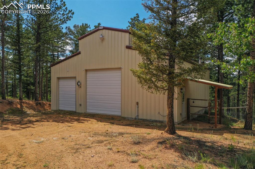 449 Woody Creek Road Divide, CO 80814 - Photo 8 of 20 a house with a outdoor space