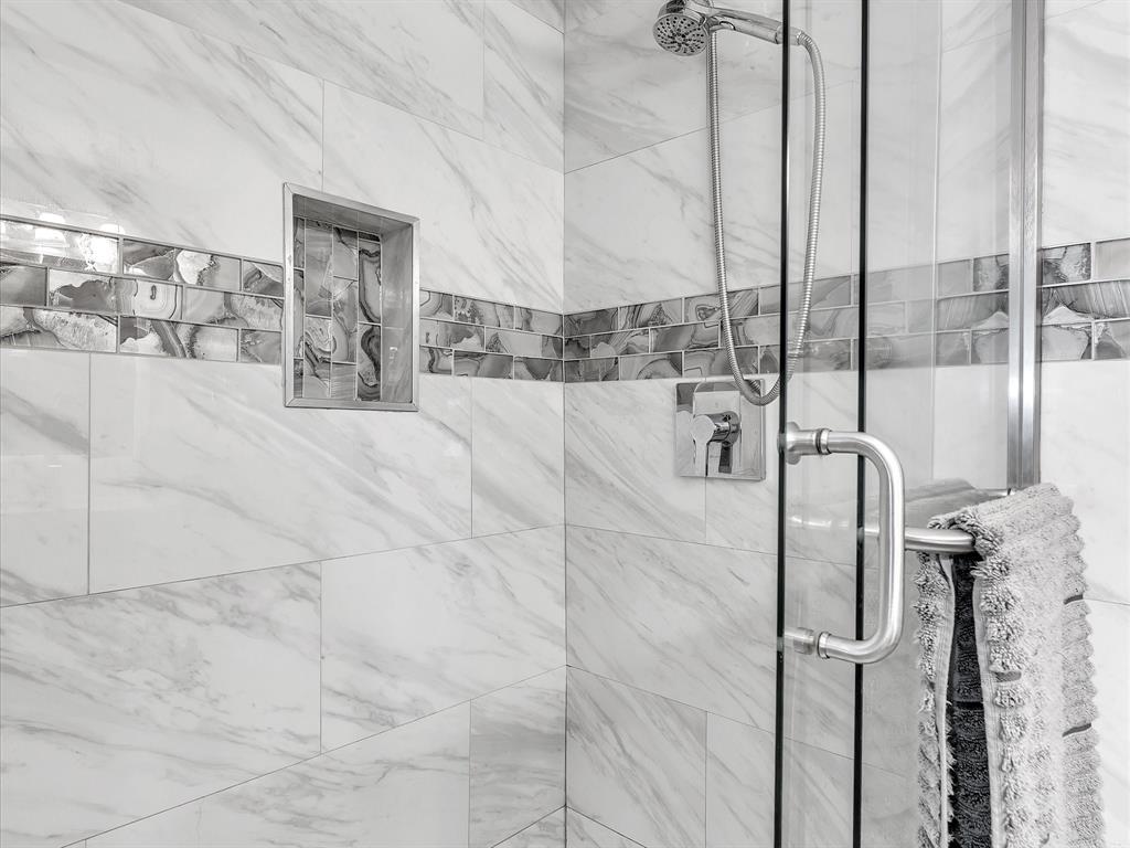 2947 Southwest 22nd Circle, Unit 28D Delray Beach, FL 33445 - Photo 16 of 32 a bathroom with a shower