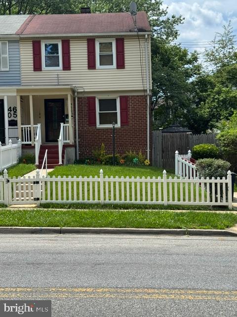 4603 Raleigh Road Temple Hills, MD 20748 - Photo 1 of 40 a front view of a house with a garden