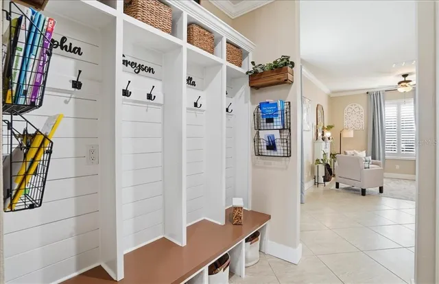 a bedroom with a bed and a book shelf