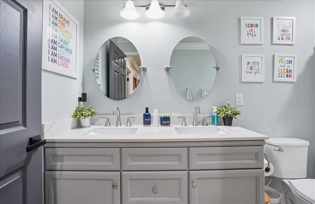 a view of a swimming pool and lounge chairs