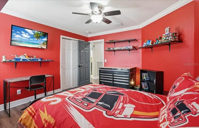 a view of a swimming pool with a table and chairs