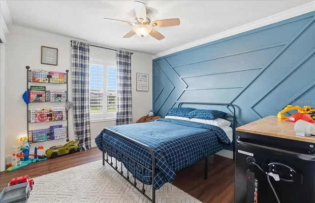 a view of a garden with a building in the background