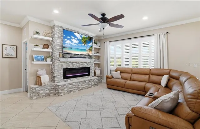 a living room with furniture and a fireplace