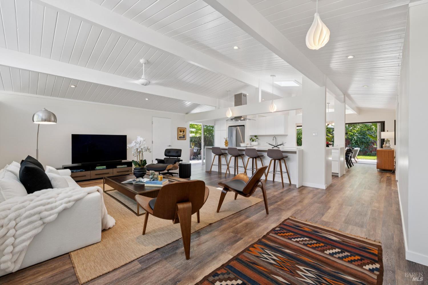 839 Greenberry Lane San Rafael, CA 94903 - Photo 12 of 57 a living room with furniture and a flat screen tv