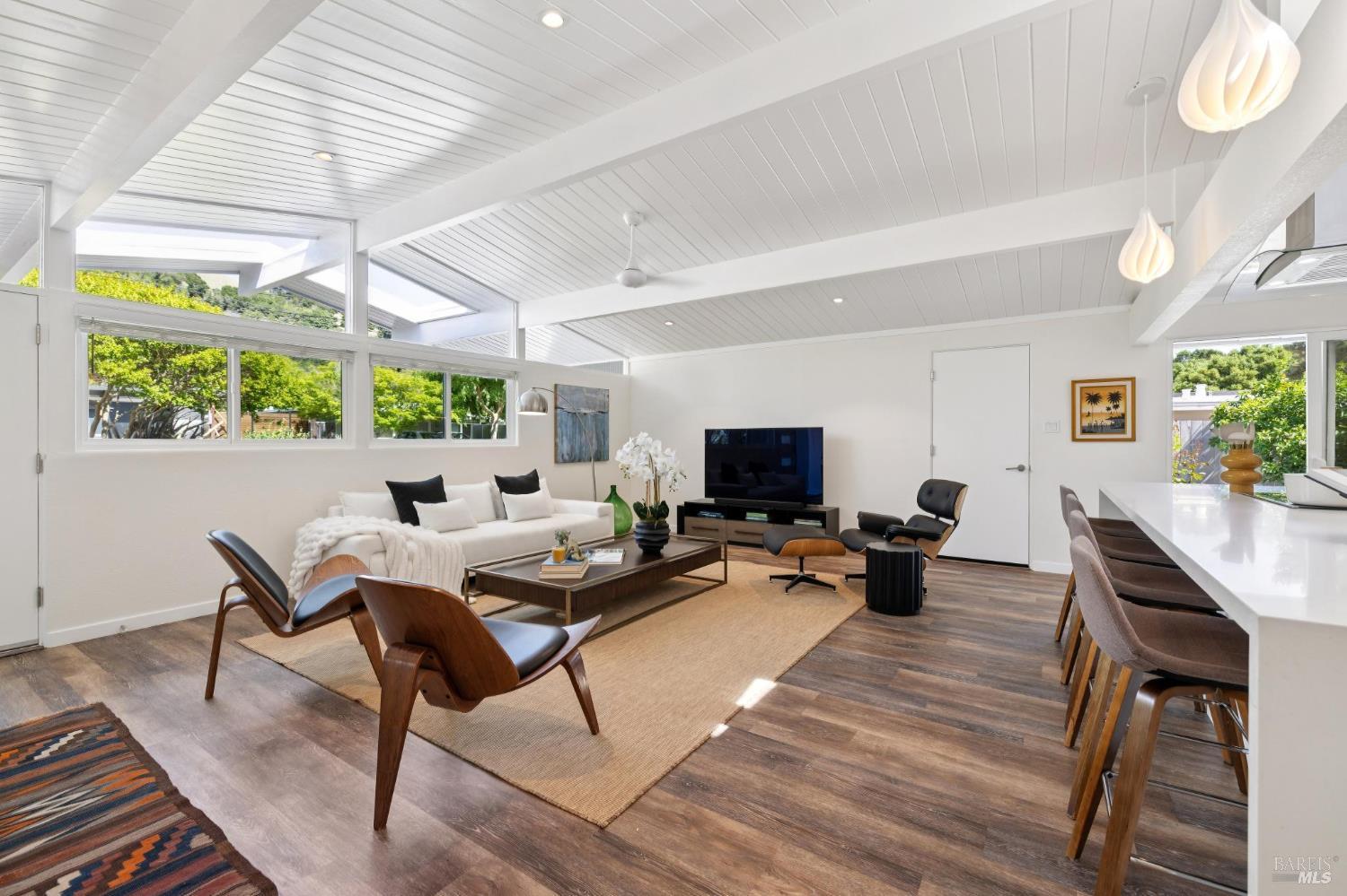 839 Greenberry Lane San Rafael, CA 94903 - Photo 13 of 57 a living room with furniture and a flat screen tv