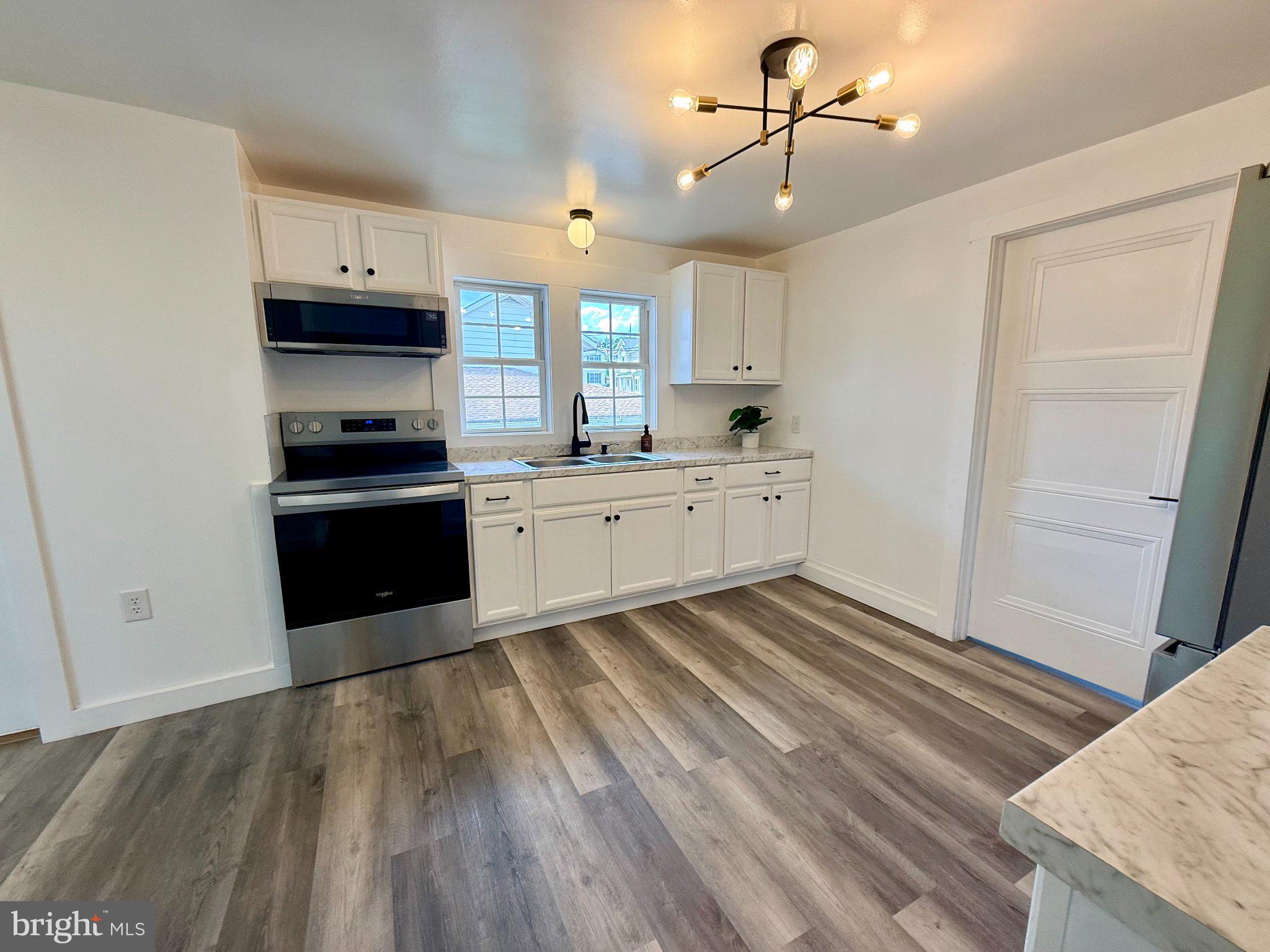 385 Herr Street Lock Haven, PA 17745 - Photo 5 of 25 Modern kitchen with sleek finishes.