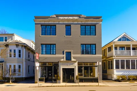 a view of a building with a street