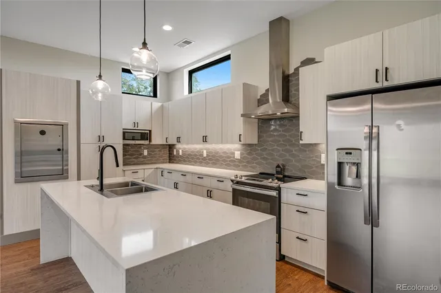 a view of hallway with wooden floor