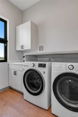 a view of balcony with wooden floor and fence
