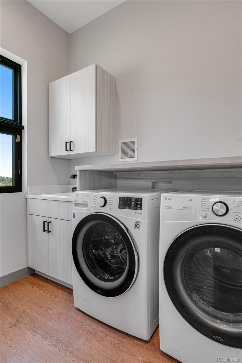 2260 Glenn Street Colorado Springs, CO 80904 - Photo 13 of 45 a utility room with dryer and washer