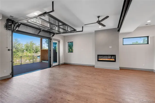 a bathroom with a double vanity sink a toilet and a shower