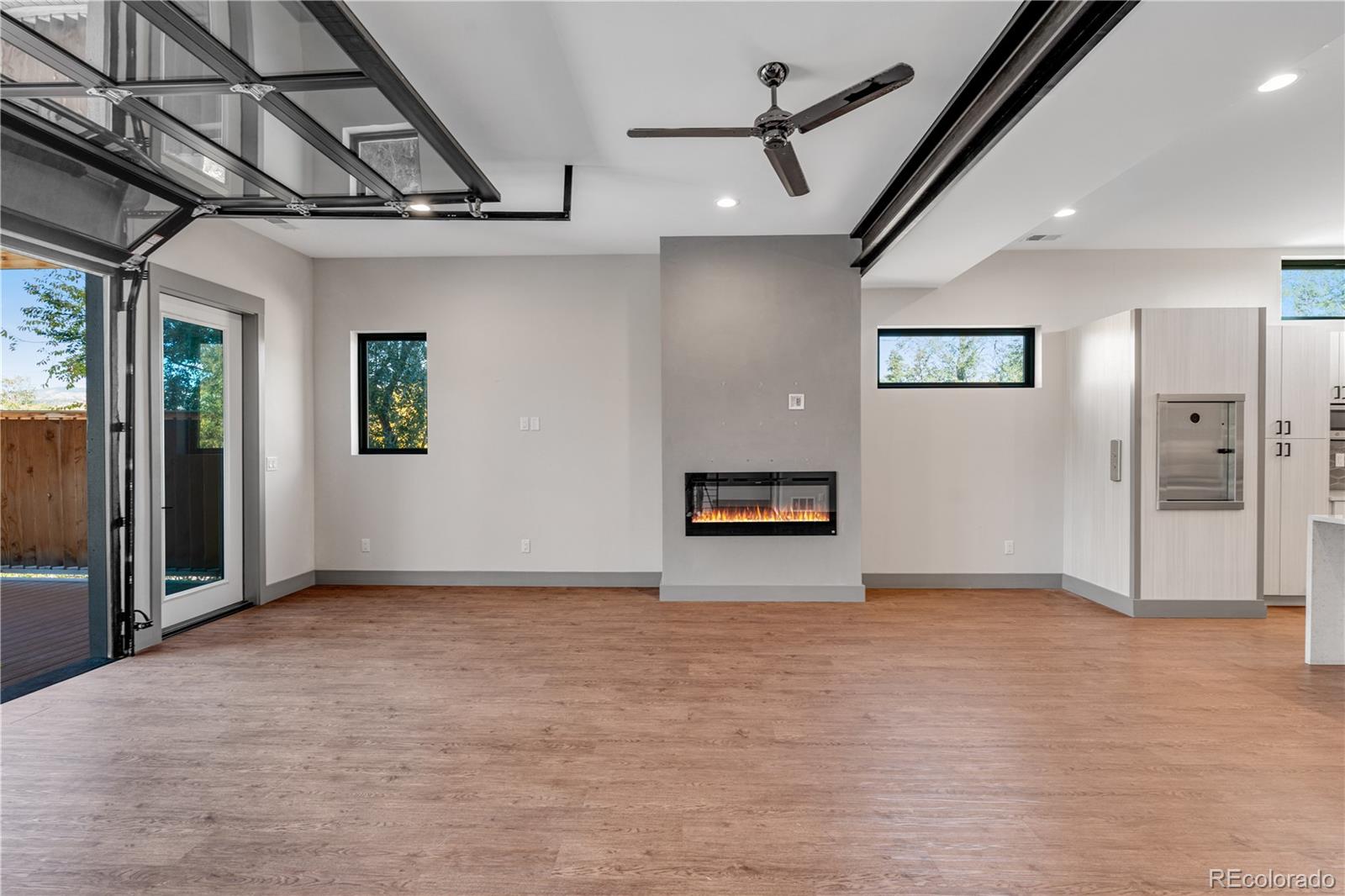 2260 Glenn Street Colorado Springs, CO 80904 - Photo 16 of 45 a view of hallway with wooden floor