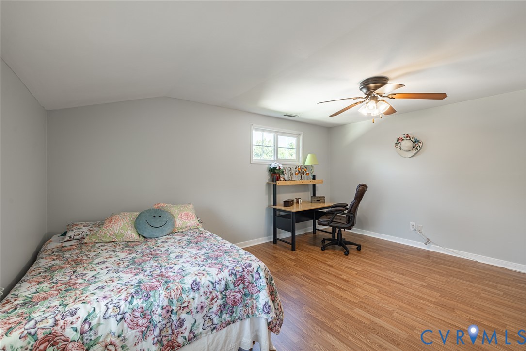 9217 Fisk Road Richmond, VA 23229 - Photo 23 of 39 a workspace with chandelier