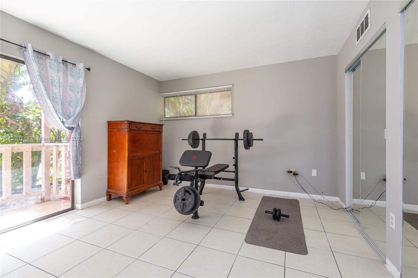 2743 Southwest 32nd Avenue Miami, FL 33133 - Photo 20 of 33 a view of a workspace with furniture and a window
