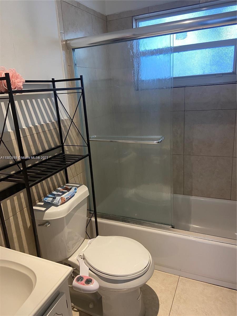 2743 Southwest 32nd Avenue Miami, FL 33133 - Photo 30 of 33 a bathroom with a sink toilet and shower