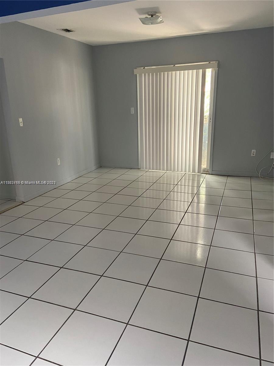 2743 Southwest 32nd Avenue Miami, FL 33133 - Photo 33 of 33 a view of an empty room and a window