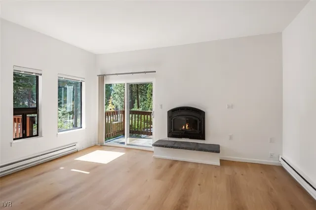 a view of a room with large windows