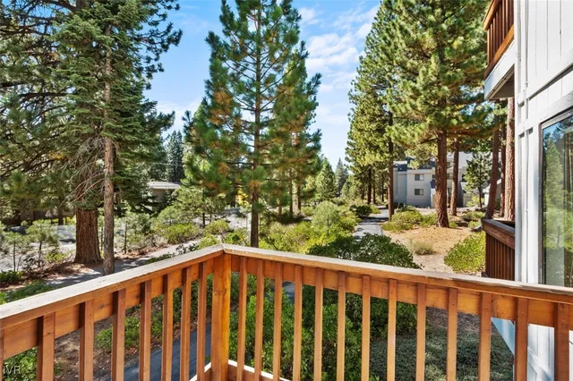 a view of a wooden fence from a balcony