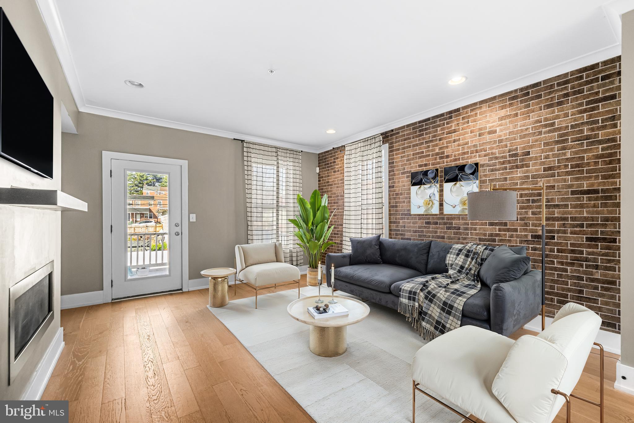 1456 Redfern Avenue Baltimore, MD 21211 - Photo 13 of 44 a living room with furniture and a flat screen tv