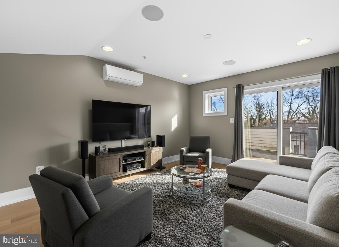 1456 Redfern Avenue Baltimore, MD 21211 - Photo 35 of 44 a living room with furniture and a flat screen tv