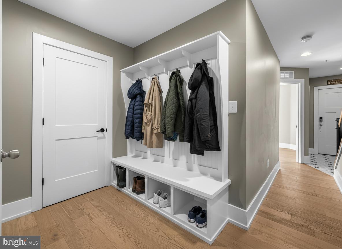 1456 Redfern Avenue Baltimore, MD 21211 - Photo 4 of 44 a view of walk in closet with clothes and shoes