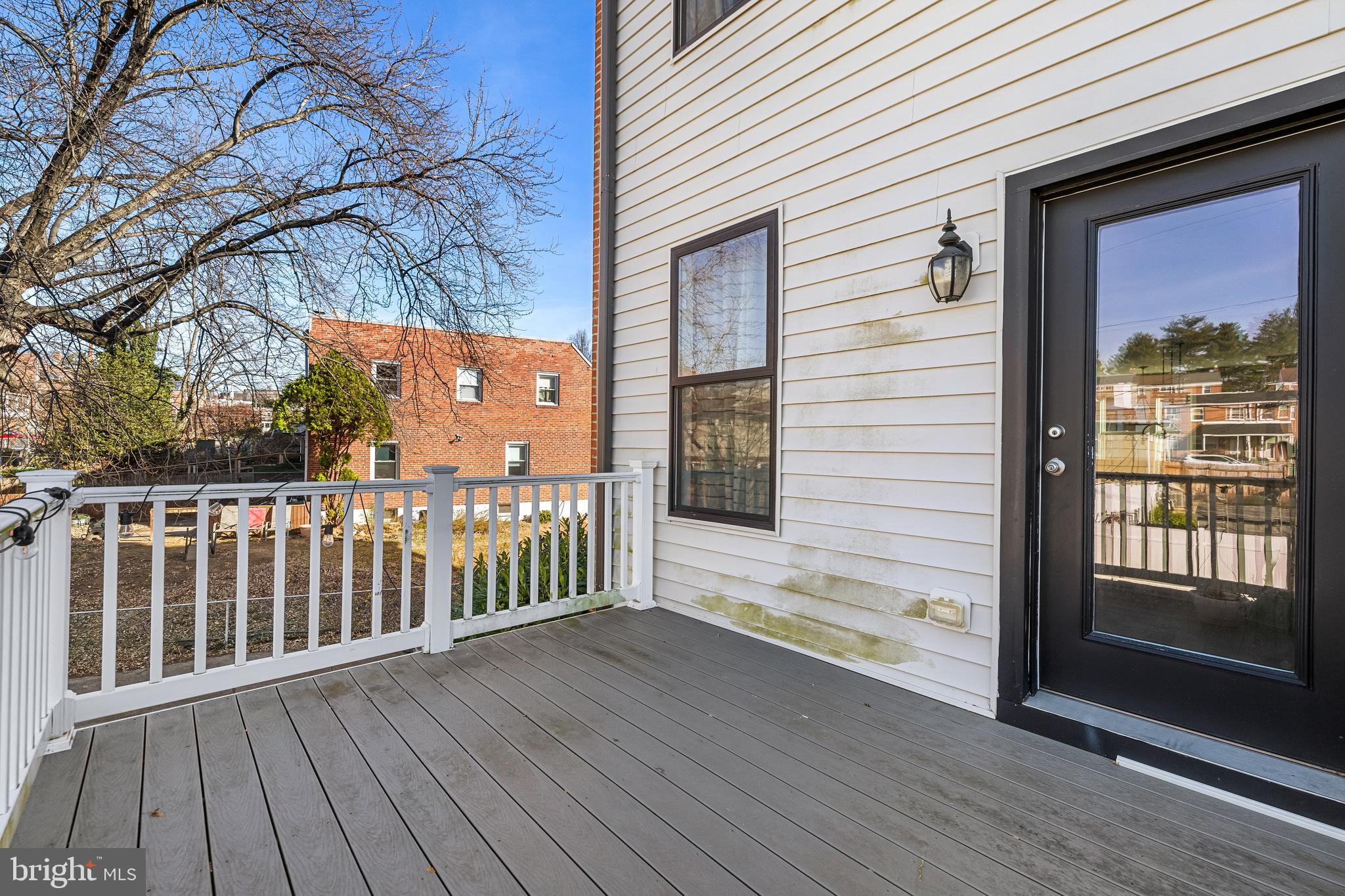 1456 Redfern Avenue Baltimore, MD 21211 - Photo 43 of 44 a view of a wooden deck with a yard