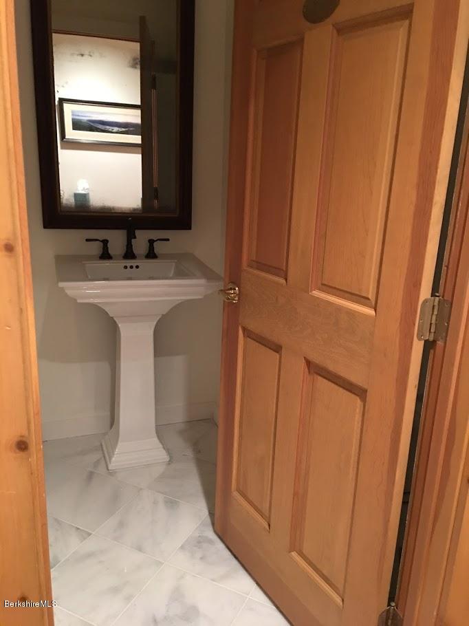 5 Jericho Road Hancock, MA 01267 - Photo 15 of 38 a bathroom with a sink and a mirror