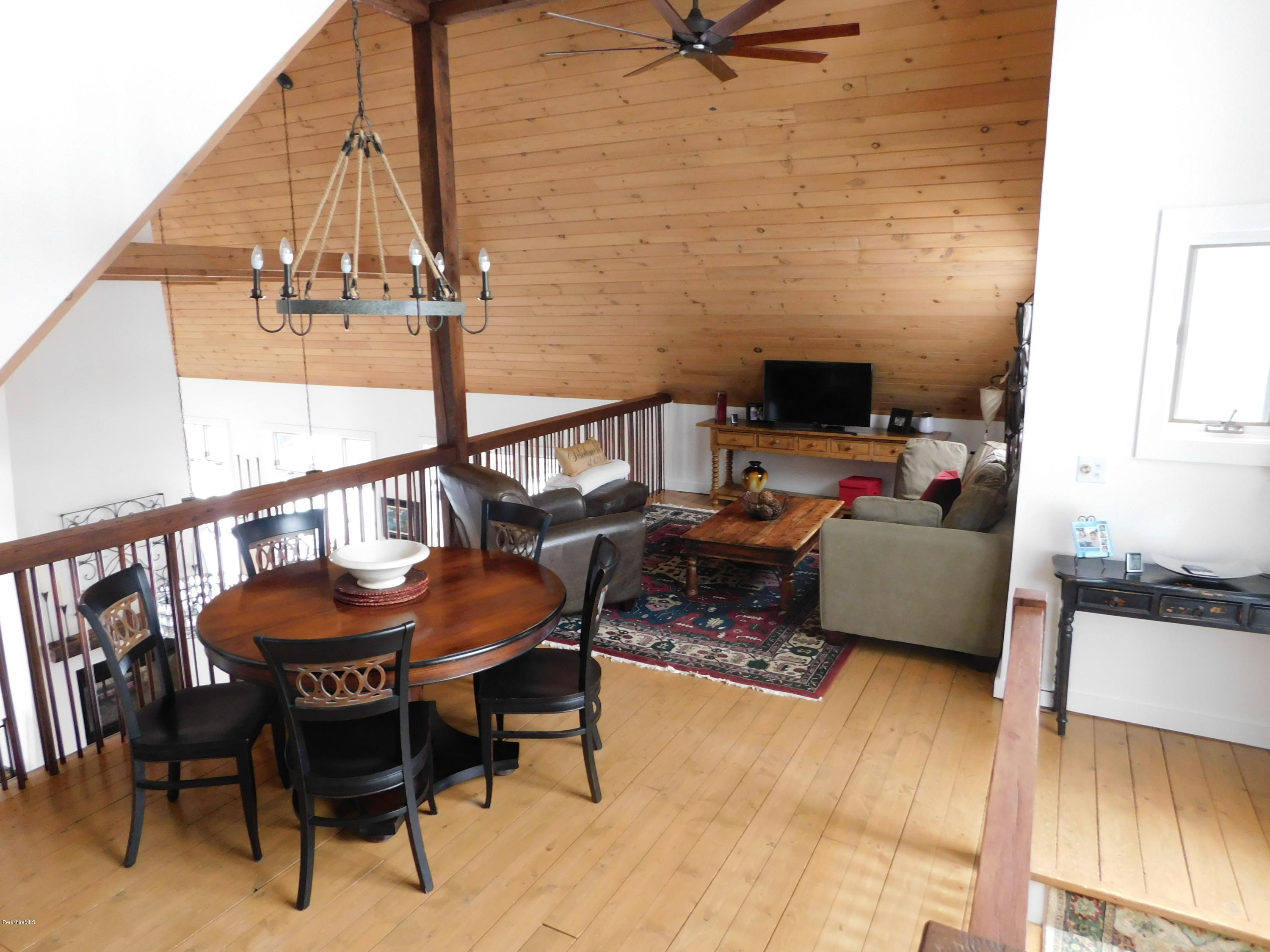 5 Jericho Road Hancock, MA 01267 - Photo 20 of 38 a living room with furniture and a flat screen tv