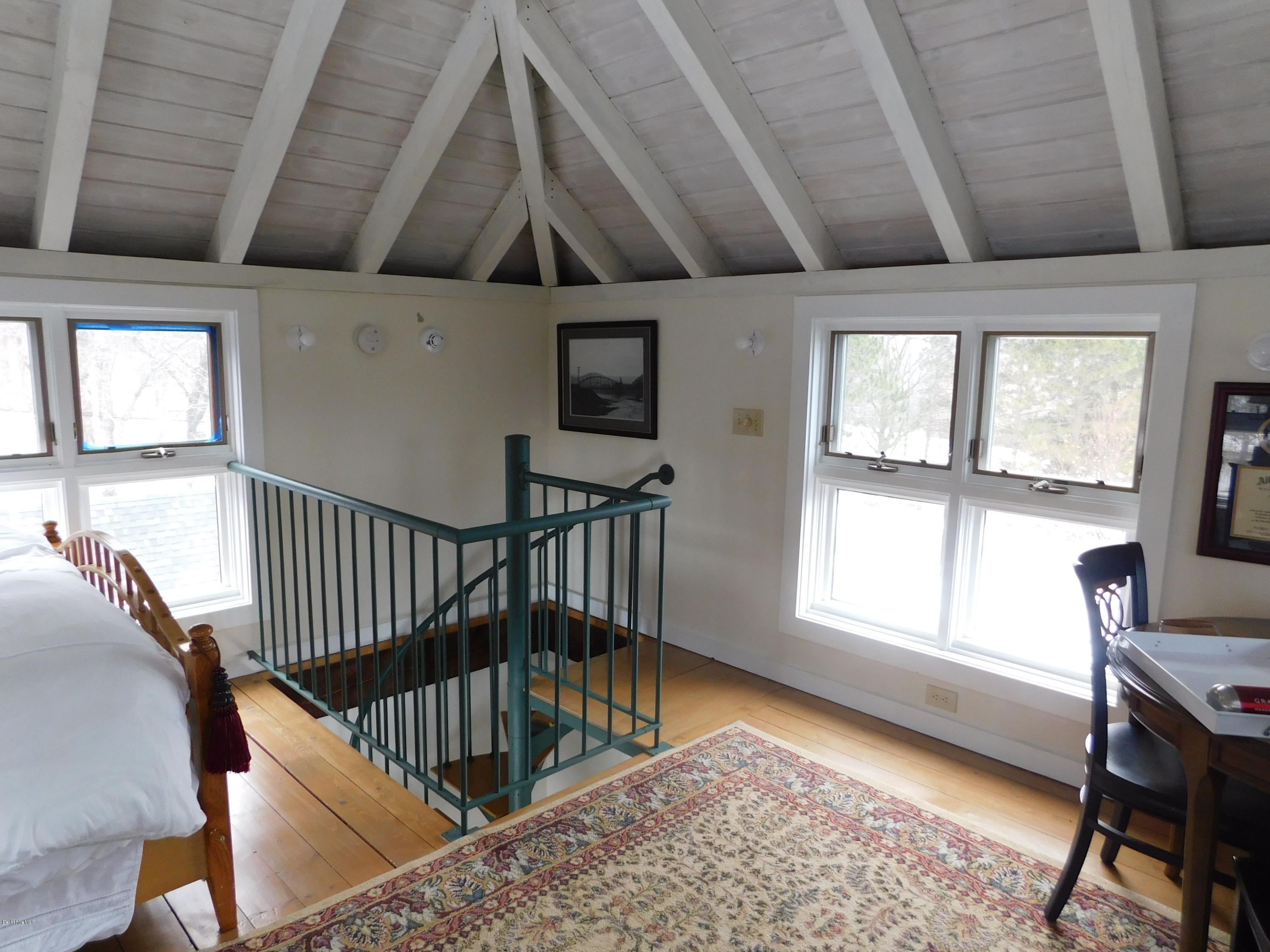 5 Jericho Road Hancock, MA 01267 - Photo 22 of 38 a view of an empty room with wooden floor and a window